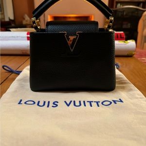 Brand new black LV Capucines. Purchased in Sydney last week. Wrong size for me.